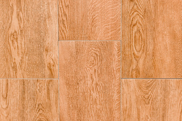 Fototapeta premium Wood texture table orange background with abstract pattern of floor boards, parquet