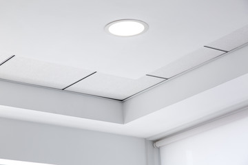 multi-level ceiling with three-dimensional protrusions and a suspended tiled ceiling with a...