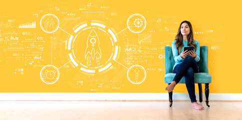 Rapid growth concept with young woman holding a tablet computer