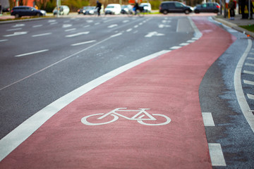 Bicycle sign on a red bike path in Europe - obrazy, fototapety, plakaty