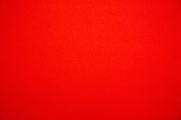Bright red background.Red cardboard texture.