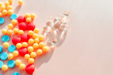 pharmaceutical pills thermometer a pink background. Copy space. the concept of health. concept of life. assorted medicines. bright pills. coronavirus