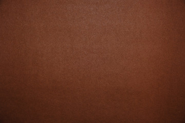 Bright brown background.Brown cardboard texture.