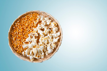 Sieve with corn, popcorn, traditional at Junina and Julina festival. Gradient blue and white...