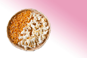 Sieve with corn, popcorn, traditional at Junina and Julina festival. Gradient pink and white...