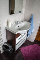Washbasin with sink and faucet in the bedroom room. Minsk, Belarus - March 01 2020