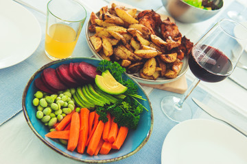 Closeup photo of served table with healthy vegetablesbowl and baked potato
