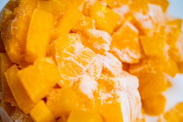Frozen Sliced Pumpkin. Closeup of frozen pumpkin slices