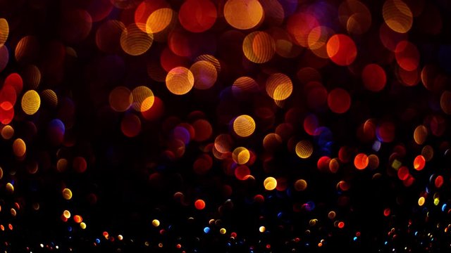 Colorful abstract bokeh lights, subtle and sparkly glowing on a background