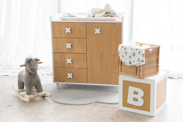 Wood design kid cupboard and drawer with a diaper changing on top