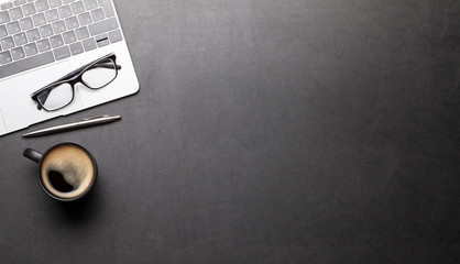 Office desk table with laptop and coffee