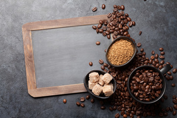 Coffee cup, sugar and roasted beans