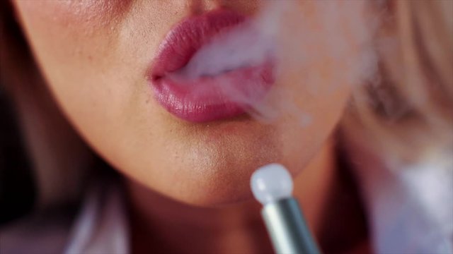 woman drinking hookah with her sexy pink lips