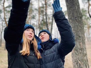 Fototapeta premium two teenage girls sisters in winter clothes