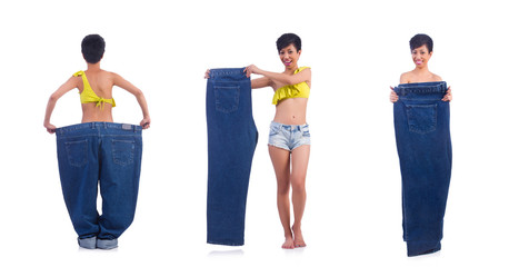 Obraz premium Woman in dieting concept with big jeans