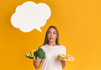 Pensive Woman Holding Plates With Healthy And Unhealthy Food, Counting Callories