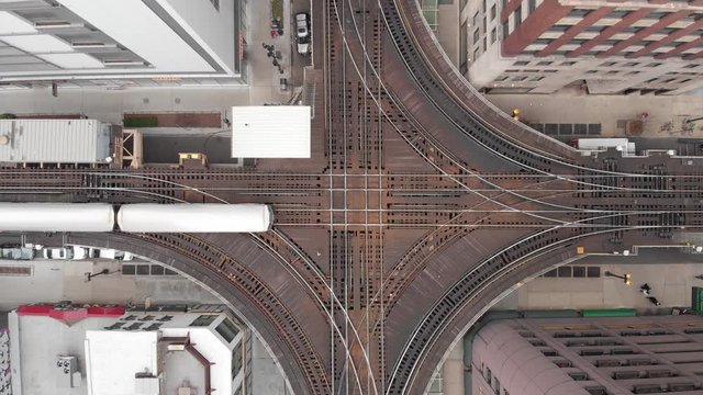 Aerial view of a train in the cross of the loop circle line in downtown, Chicago, Illinois, United States of America