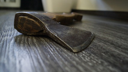 the old axe lay on the wooden floor