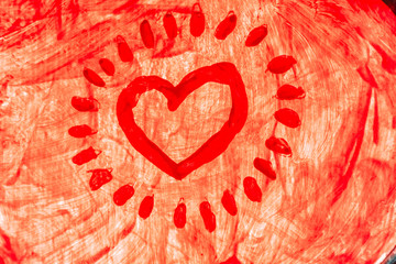 A heart painted on a red glass with thick romantic strokes.