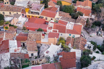 Naklejka premium Aerial view of preserved historic buildings in the Plaka neighborhood of Athens, on the slopes of Acropolis, Greece