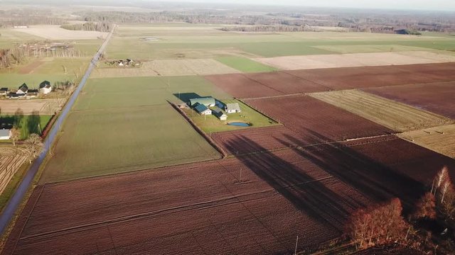 Rural landscape in sunny day. Aerial dolly in