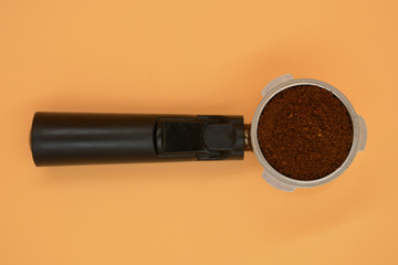 coffee pause, fresh coffee for coffee grinder into a portafilter for a professional espresso machine