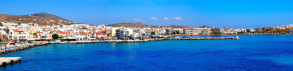 Fototapeta na wymiar superb panoramic view of the port of Tinos, magnificent Cyclades island in the heart of the Aegean Sea, dominated by the Panaghia Evangélistria Church