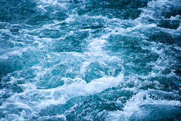 Obraz na płótnie Canvas Crashing Waves of sea and Aerial view to ocean wave. Blue water background.
