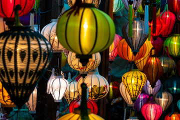 Fototapeta na wymiar Traditional Vietnamese Colorful Lanterns at Night on the Streets of Hoi An, Vietnam.