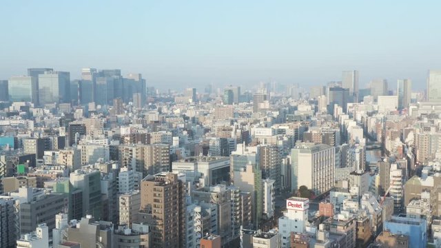 Tokyo, Japan. Aerial pan over concrete jungle 4k