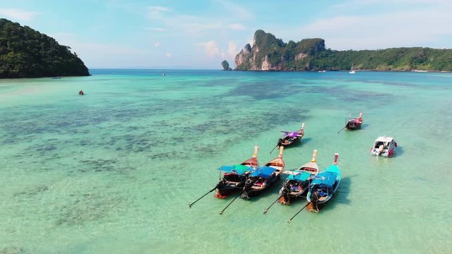 Aerial view to Lo Dalum beach with boats in a sunny day, Koh Phi Phi, Thailand