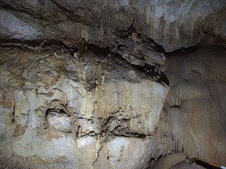 Under the ground. Beautiful view of stalactites and stalagmites in an underground cave-Marble cave, southern Crimea. Speleology, the concept of active recreation, extreme travel.