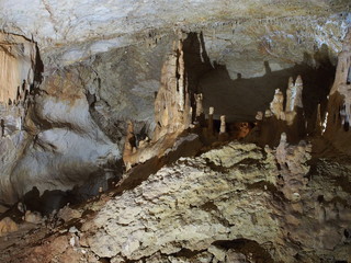 Under the ground. Beautiful view of stalactites and stalagmites in an underground cave-Marble cave, southern Crimea. Speleology, the concept of active recreation, extreme travel.