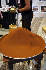 Hand-poured and ground coffee powder