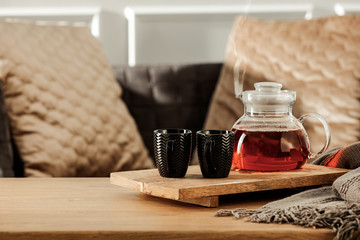 Still life details of the home living room interior on a wooden table with free space for an advertising product for Easter