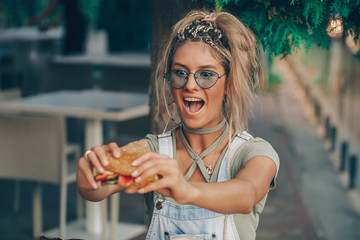 Woman fast food. Fast food photo. 