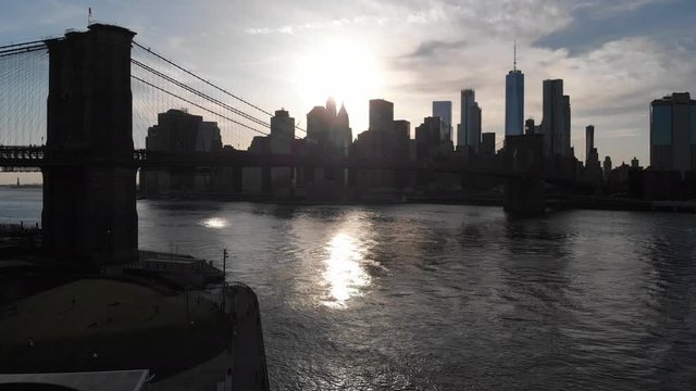 Aerial view of New York city from Brooklin Bridge, over East River, Classic view of the city at sunset, Unites States of America