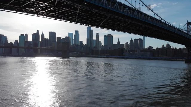 Aerial view of New York city from Manhattan Bridge and Brooklin Bridge, over East River, Unites States of America