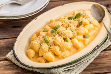 Potato gnocchi with spiced pumpkin sauce