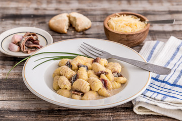 Four cheese capelettis with forest mushroom sauce