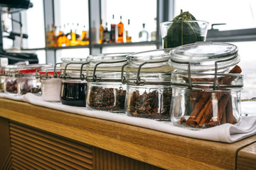 Spices in jars in a bar kitchen