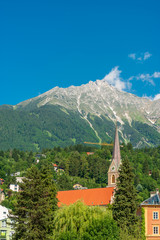 Fototapeta premium Top view to red roofs in Innsbruck old city, Austria.