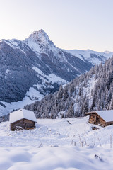 Fototapeta premium Winter in the Austrian Alps, View of Grosser Rettenstein Mountain in the morning light of a winterday