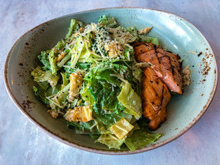 Delicious salmon cesar salad 
