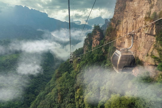 Cable crossing Tianzi Mountain and Yellow Stone Stronghold (Huangshi Zhai) in Yuanjiajie Scenic Area , Zhangjiajie National Park, China