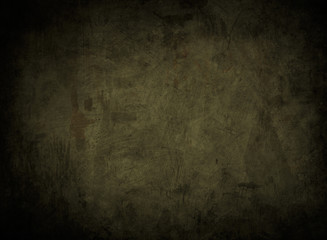 green abstract background or texture with black vignette borders