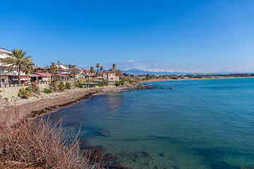 Fototapeta premium Blue sea at a beautiful beach with blue sky