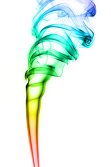 Rainbow smoke on white background. Smoke goes from bottom to top. Smoke spirals closer to top of the photo