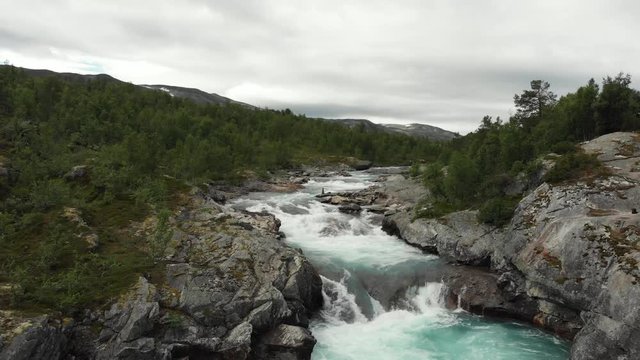 Beautiful wild river called Otta in Norway.
Filmed with a drone.
Flown backwards across the river.
