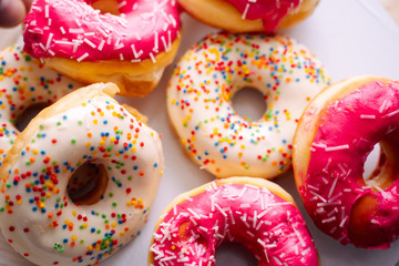 donuts with icing isolated on white background